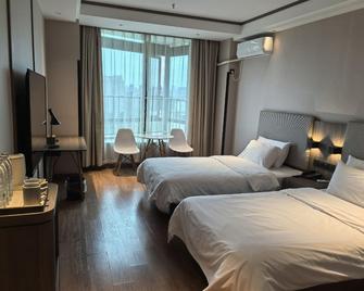 Hanting Hotel Nanjing South Railway Station Software Avenue - Nanjing - Bedroom
