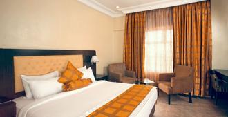 D Palms Airport Hotel - Lagos - Schlafzimmer
