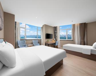 Home Inn Neo Linyi Binhe Avenue - Linyi - Bedroom