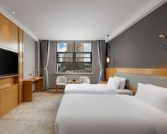 Qiyue Hotel - Suining - Bedroom