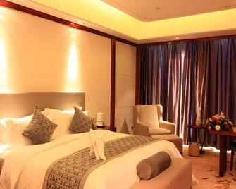 Xining Sapphire Hotel - Xining - Schlafzimmer