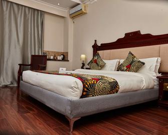 بست ويسترن بلس لوساكا جراند هوتل - لوساكا - غرفة نوم