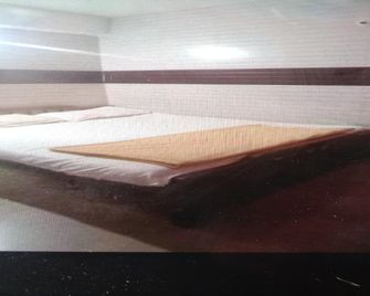 OYO Karthik Stay - Sagara - Bedroom