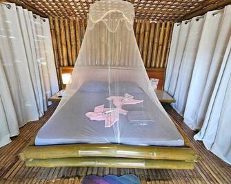 Tambayan Rooms and Cottages by SMS Hospitality - Carmen - Habitación