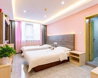 Jinpeng Business Hotel - Luoyang - Bedroom