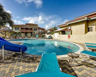 Palma Real 69 - Palm Beach 2 bedrooms Condo - Noord - Zwembad