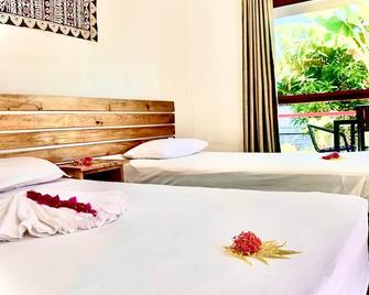 Beach Escape Resort - נאדי - חדר שינה