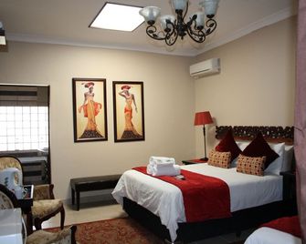 African Tribes Guest Lodge - Johanesburgo - Habitación