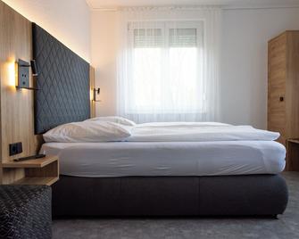 Hotel-Cocco-Bello in der Villa Foret - Grünbühl - Schlafzimmer