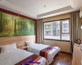 Xinyaju Business Hotel - Suining - Bedroom
