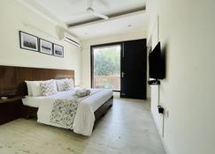 Olive Service Apartment Near Artemis - Gurugram - Phòng ngủ