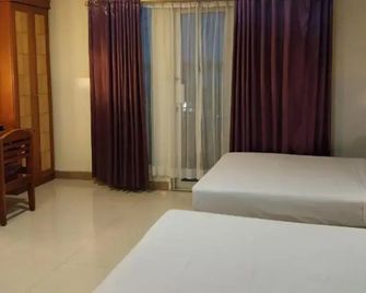 Hotel Celebes - מאנאדו - חדר שינה