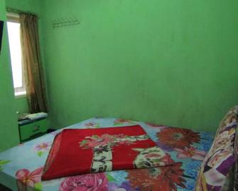 Hotel Nirmala - Sarangan - Habitación