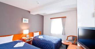 Hotel Unisite Sendai - סנדאי - חדר שינה
