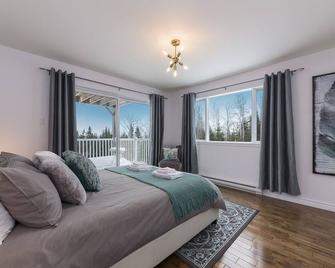 The Awakening of the River. Relaxation, spa, nature and skiing - L'Isle-aux-Coudres