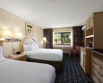 Space Coast Hotel Titusville-Kennedy Space Center - Titusville - Makuuhuone