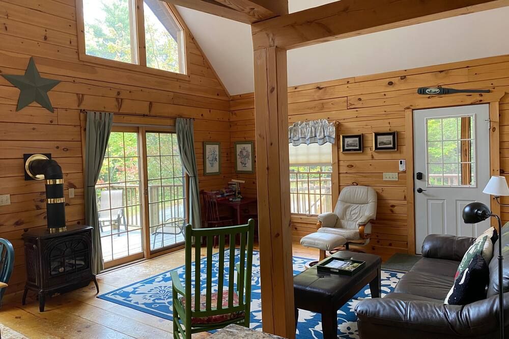 Light-Filled Log Home, 4 Wooded Acres, & Lake Access. The water is 0.4 mi away.