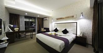 Xiamen Jinglong Hotel - Xiamen - Bedroom