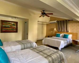 Botanic Garden Hostal - Santo Domingo - Habitación