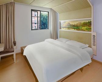 Sancun Bi'an Hostel - Kunming - Bedroom