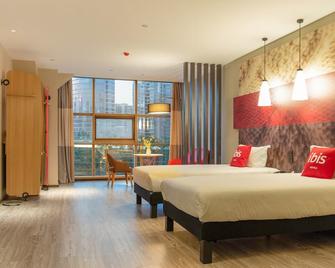 ibis Luoyang Baolong Square Hotel - Luoyang - Schlafzimmer
