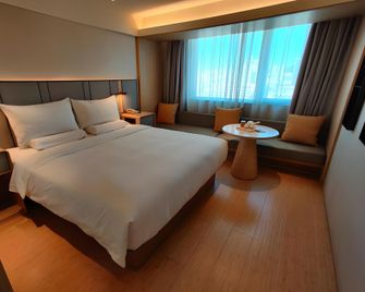 Ji Hotel Xianggang Middle Road Qingdao - Qingdao - Bedroom