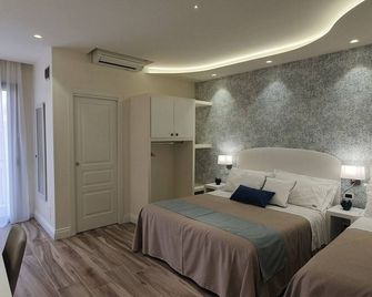 Ines bed and breakfast - ג'יארדיני נאקסוס - חדר שינה