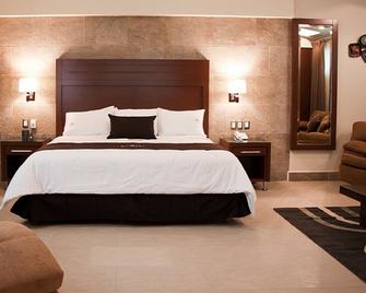 Hotel Ecce Inn & Spa - Silao - Schlafzimmer