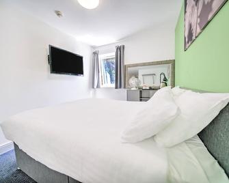 Go2 Gloucester Hotel By OYO - גלוצ'סטר - חדר שינה