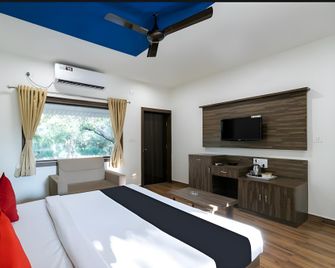 Bright View Cottage - Sasan Gir - Schlafzimmer