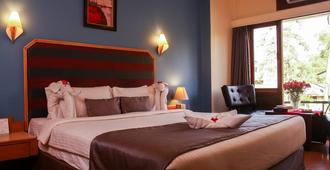 Hotel Polo Towers Shillong - Shillong - Camera da letto