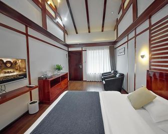Lijiang Tongfu Inn - Lijiang - Yatak Odası