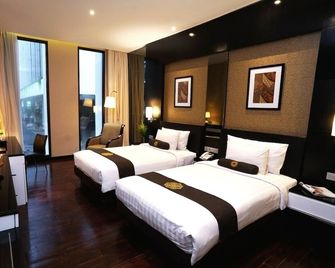 Java Heritage Hotel Purwokerto - Purwokerto - Schlafzimmer