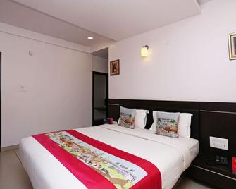 Aavass Inn Paradise - Mysore - Bedroom