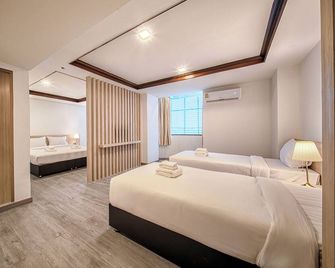 โรงแรมบีทู ศรีสะเกษ บูติค แอนด์ บัดเจท - ศรีสะเกษ - ห้องนอน