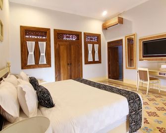 Java Villas Boutique Hotel & Resto - Yogyakarta - Bedroom