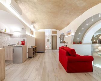 Open space letto Queensize con vista doccia - Cava de' Tirreni - Sala de estar