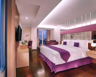 Quest Hotel Darmo - Surabaya By Aston - Surabaya - Bedroom