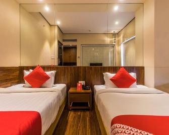 Treebo Sapphire Star - Indore - Schlafzimmer