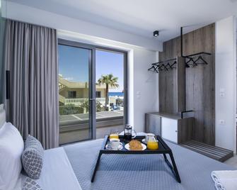 xSuites Hotel - Nea Kydonia - Huiskamer