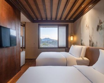 Huayu Donglin Boutique Holiday Hotel - Lijiang - Habitación
