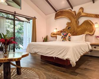 Ecotica Boutique Hotel - מנואל אנטוניו - חדר שינה