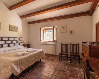 Agriturismo Podere Binacco - Scarlino - Slaapkamer