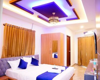 Royal Suites - Bengaluru - Bedroom