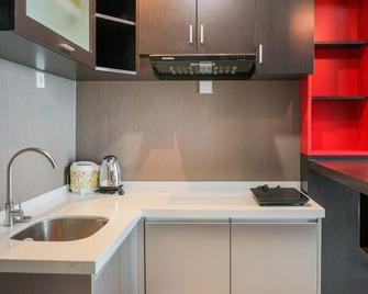 Modern Design 1BR Apartment at Brooklyn Alam Sutera By Travelio - Curug