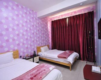 Ru Chun Si Ji Hostel - קונמינג - חדר שינה