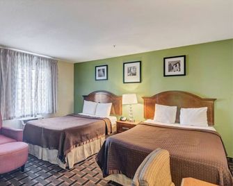 Savannah Garden Hotel - סאוואנה - חדר שינה