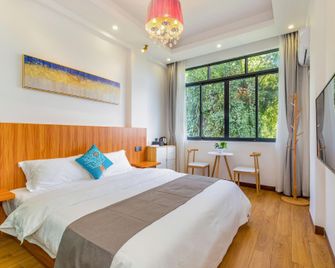 Yunjing Inn (Twenty-Yuan Scenic Area Branch, Xingping Ancient Town) - Guilin - Bedroom