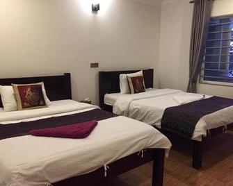 Twin Home Guesthouse - Kampot - Habitación