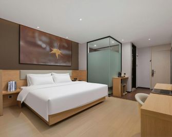 Iu Hotel Xingyi Sports Center - Qianxinan - Bedroom